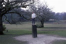 Warren Masters poses on the Rufus Stone near Upper Canterton