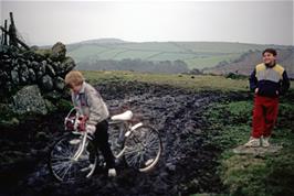 Nathan watches Chris Bailey (?) test the mud on Skerraton Down