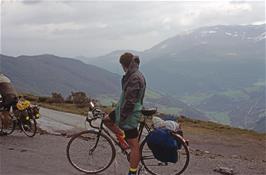 Mark Moxham admires the fabulous view down to the Vikja river valley just after we emerge from the Storehaug tunnel.  This valley leads to the Sognefjord at Vik from the right of our descent road whilst the Hopra valley meets it at Vik from the left [Remastered scan, 25/9/2019]