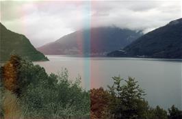 Nordfjord as seen from the coastal road between Faleide and Stryn, with the Aarheim coast road on the left (Film damaged by light during removal from camera) [New scan, September 2019]