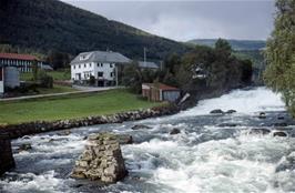 View back to Viken guest house, Viksdalen, from the bridge over the fast-flowing river that empties into Viksdals lake [Remastered scan, August 2019]