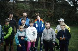 Some members of the group pose for a photo in the gardnes at Maypool youth hostel [Remastered scan, July 2019.  Kodachrome 64 film]