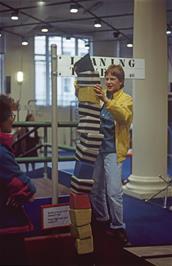 Philip Robinson builds a tower in the Launchpad exhibition at the Science Museum, London, watched by Simon Hopper [New scan, July 2019.  Kodachrome 64 film]