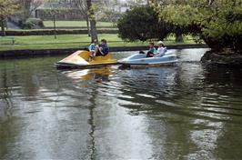 Ian Gibbs, Martin Hills, David Waldron and Jamie Davey race each other on the pedal boats at Trenance park, Newquay [Remastered scan, July 2019]