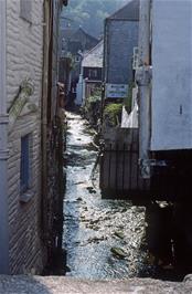 The River Pol runs between rows of cottages in delightful Polperro [New scan, July 2019]