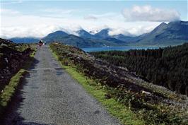 Setting off from Raasay hostel to meet the 9.15 ferry to Skye, with low clouds mingling with Skye's mountains in the distance [New scan, July 2019]