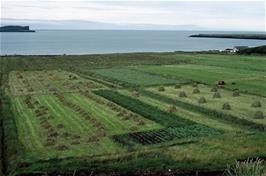 Traditional haymaking by hand at Stenscholl, Staffin Bay, Skye, with Staffin Island visible on the right [New photo, July 2019]