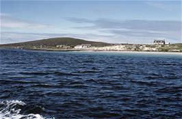 Thatched cottages near Rushgarry House by the silver sand beaches of Baile, Isle of Berneray, as seen from our passing ferryboat [New scan, July 2019]