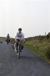 Tim Guard, closely followed by Matthew Pryer, crossing the cattle grid at Merry Bent Hill, near Stocks Reservoir [Remastered scan, June 2019]
