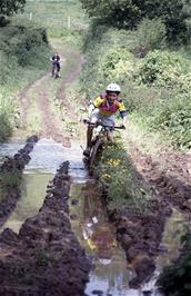 Paul Oakley, running into a few difficulties, while Chris Platt eagerly awaits his turn.