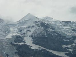 Silberhorn, with Jungfrau in the clouds behind, 4158m, as the train continues upwards to Klein Scheidegg