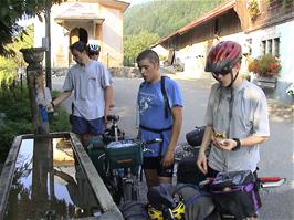 A welcome water stop at the public fountain at Chapelle du Roc, Le Bu, 49.0 miles into the ride