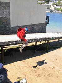 Will does a flying leap from the causeway at East Portlemouth, 2.0 miles into the ride