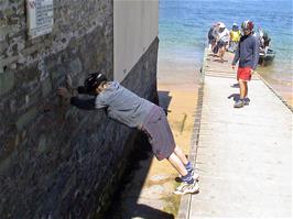 The second group disembarks from the ferry at East Portlemouth while Louis does more tricks for the camera