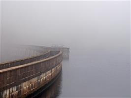 The 'cormorant' just visible on the centre of the dam