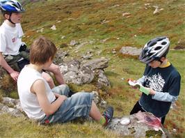 Joe, Dennis and Keir discover a Dartmoor letterbox on Buckland Beacon