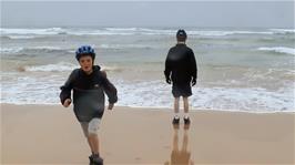 Fun on the beach at Constantine Bay as the first raindrops start to fall on what was supposed to be a dry day