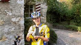Joe completes the installation of his new speedo outside Brugg youth hostel