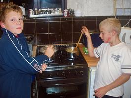 Ryan and Glen prepare their food at Bellever YH