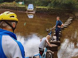 Ben and Alex cross the stepping stones at Tuckenhay
