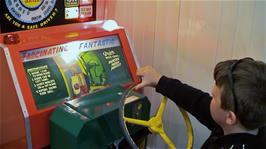 Ash plays the latest arcade racing game at Wookey Hole Caves