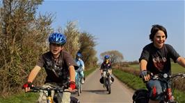 Sam and Zac riding with the group on Long Moor Drove
