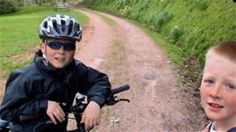 Ash and Alex, who have been having fun skidding their bikes on the hostel grass