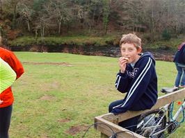 Henry eats a snack at Spitchwick - new photo for 2025