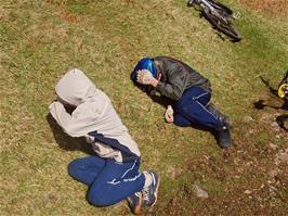 A grassy bank provides shelter from the wind for Dennis & Sam