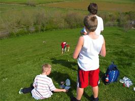 Ashley and Alex rolling down Burrow Mump