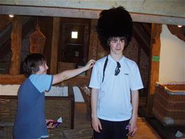 Matt tries on a bearskin - with willow support accessories - at the Wetlands centre