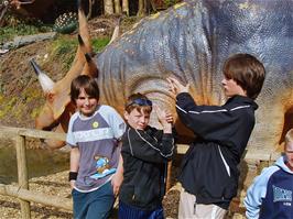 Zac, Ashley, Matt & Alex with the dinosaurs at Wookey Hole
