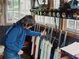 Zac playing signalman at Staverton signal box