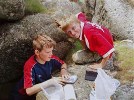 Ashley and Olly find the first letterbox at Saddle Tor