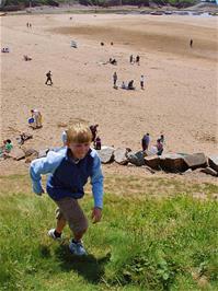 Olly looks for good views of Bude beach after lunch - new photo for 2025