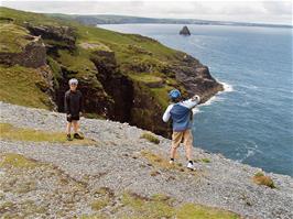 Olly and Ashley outside Tintagel Youth Hostel, looking towards Gull Rock - new photo for 2025