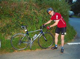 Julian with his very expensive bike at the entrance to the Church House Inn, Rattery - new photo for 2025