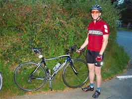 Julian with his very expensive bike at the entrance to the Church House Inn, Rattery