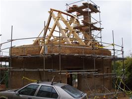 Construction of a 'mud hut' in Dartington village - new photo for 2025