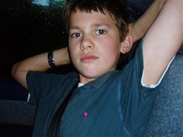 Ash takes photos in the back of Michael's car on the way home from Black Forest Lodge - new photo for 2025