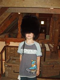 Zac tries on the Bearskin at the Willows and Wetlands Centre, Meare Green