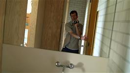 Michael takes a video of the modern facilities in our dorm at Basel Youth Hostel