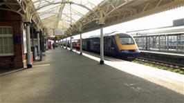 Our train leaves Taunton station as we reattach our panniers to the bikes