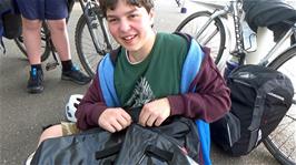 Lawrence attempts to repair the zip on his panniers at Taunton station