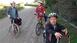 John explains how a passing motorist mistook John for a child and stopped to complain to Michael for leaving him at the back of the group!