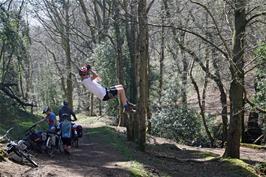 George tests the rope swing in Selworthy Combe