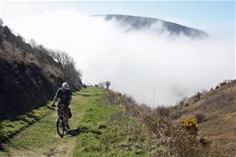 The coast path from Hunter's Inn finally rises above the coastal fog