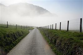 Dillan climbs out of the coastal fog at Lee Abbey