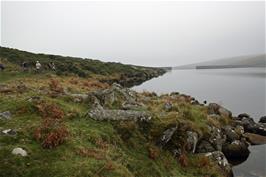 Negotiating the rough track along the side of the reservoir