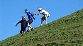 Lawrence helps George down the side of Burrow Mump